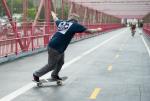 Downhill Skateboarding Over the Williamsburg Bridge