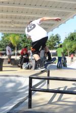 Jereme Knibbs Gonz Trick on the Bar at Innoskate