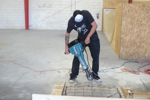 Casey Jackhammers the Red Curb