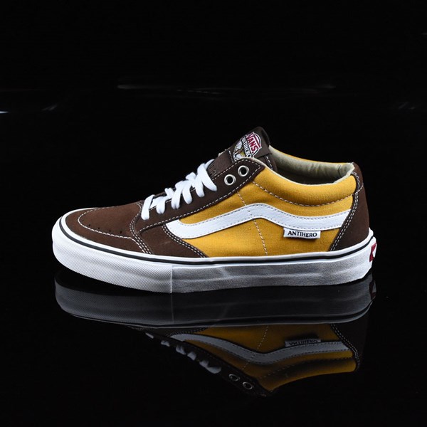 brown and yellow vans